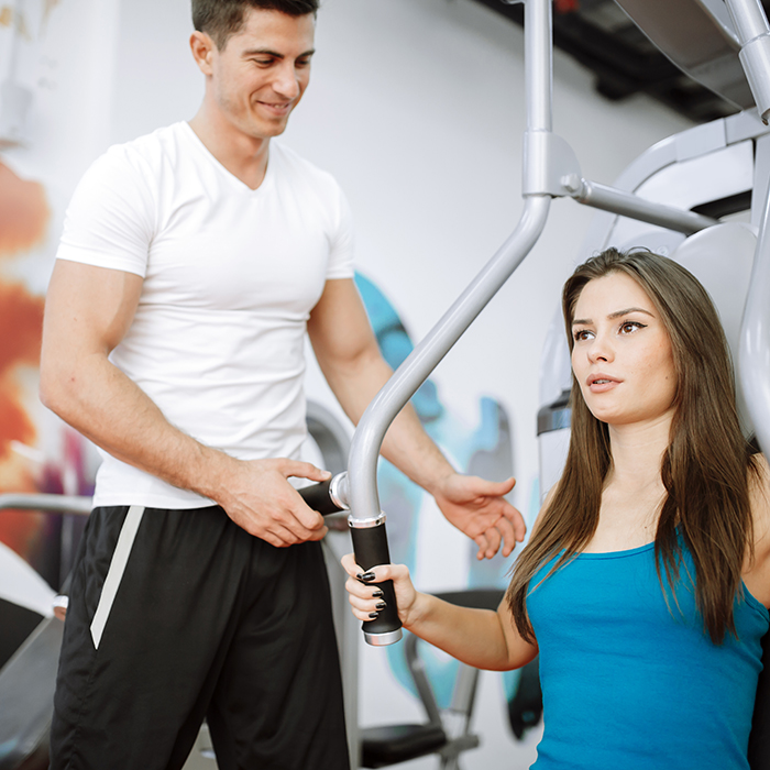 Beautiful woman exercising in gym